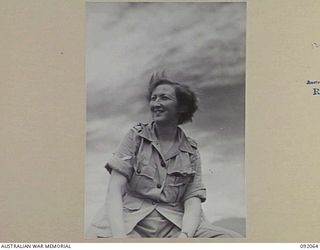 LAE, NEW GUINEA. 1945-05-19. LANCE CORPORAL J.E. KERR, AUSTRALIAN WOMEN'S ARMY SERVICE MEMBER FROM CLEVELAND NEW ZEALAND, ON A LAUNCH TRIP FROM LAE TO SALAMAUA ORGANISED BY ARMY AMENITIES SERVICE. ..