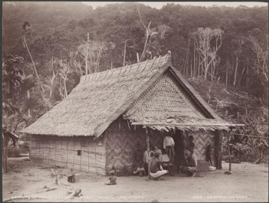 Villagers outside the teachers house at Kilomama, Buala, Solomon Islands, 1906 / J.W. Beattie