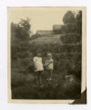 Two young children outside