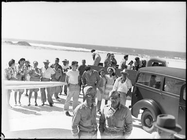 Group alongside Dakota aircraft at Aitutaki airfield