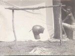 Human head being dried, Papua New Guinea, ca. 1900