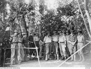 FINSCHHAFEN AREA, NEW GUINEA, 1943-10-28. GROUP PORTRAIT OF OFFICERS OF THE 2/2ND AUSTRALIAN MACHINE GUN BATTALION
