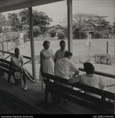 Men and women on veranda