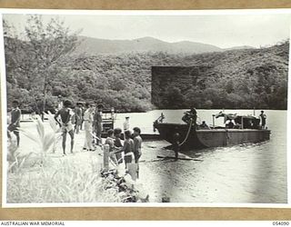 BALASANA, NEW GUINEA, 1943-07-06. LANDING CRAFT OF THE 1ST AUSTRALIAN WATER TRANSPORT GROUP (SMALL CRAFT) MAINTENANCE BASE, BEACHING AT THE CAMP