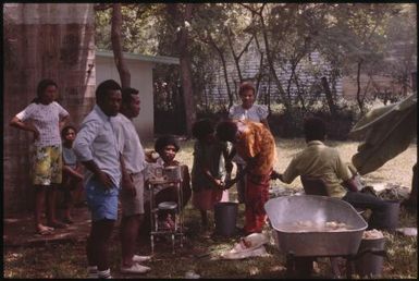 Malaria Control Service national staff prepare an earth oven for a party (3) : Papua New Guinea, 1976-1978 / Terence and Margaret Spencer