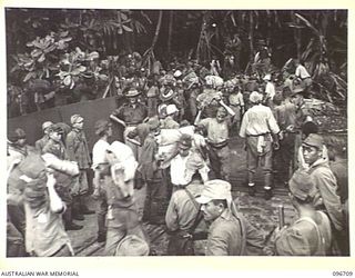 KAIRIRU ISLAND, NEW GUINEA. 1945-09-17. FOLLOWING THE SURRENDER ALL JAPANESE NAVAL PERSONNEL ON KAIRIRU ISLAND WERE TRANSFERRED TO MUSCHU ISLAND. SHOWN ACTIVITY AT THE EMBARKATION POINT - JAPANESE ..