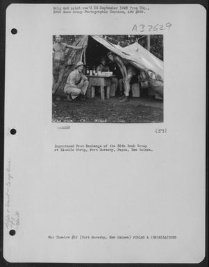 Improvised Post Exchange of the 38th Bomb Group at 14-mile Strip, Port Moresby, Papua, New Guinea. (U.S. Air Force Number 3A32629)