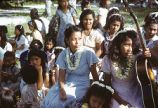 Native women and children with guitar, Likiep Atoll, August 20, 1949