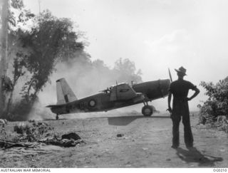 1943-11-13. A VULTEE VENGEANCE DIVE BOMBER AIRCRAFT OF NO. 24 SQUADRON RAAF BEING WARMED UP BEFORE TAXIING OUT ONTO THE AIRSTRIP READY FOR TAKE OFF