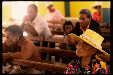 Woman sitting in church, Manihiki, Cook Islands