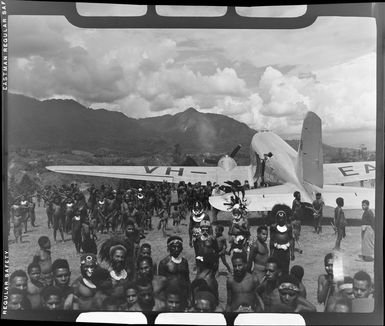 Qantas Empire Airways aircraft VH-EAP, on airstrip at Kerowagi, Papua New Guinea