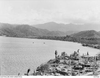 SALAMUA, NEW GUINEA. 1943-09-19. HARBOUR COASTLINE. TO JOIN PHOTOGRAPHS 57554 AND 57555