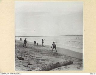 BRANDI, NEW GUINEA, 1945-09-07. TROOPS OF 35 INFANTRY BATTALION PLAYING ON THE BEACH