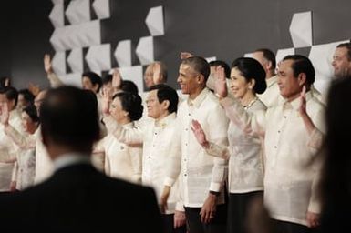 Barack Obama joins Asia Pacific Economic Cooperation Summit leaders and spouses for a group photo in Pasay, Metro Manila, Philippines, November 18, 2015