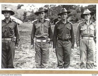 RAMU VALLEY, NEW GUINEA. 1944-01-15. OFFICERS OF THE 58/59TH INFANTRY BATTALION, 15TH INFANTRY BRIGADE. THEY ARE: TX4464 LIEUTENANT F. O. SMITH (1); NX13870 LIEUTENANT H. J. SIMMONS (2); MR WRENCH, ..