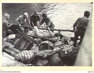 KAIRIRU ISLAND, NEW GUINEA. 1945-09-17. FOLLOWING THE SURRENDER ALL JAPANESE NAVAL PERSONNEL ON KAIRIRU ISLAND WERE TRANSFERRED TO MUSCHU ISLAND. AMONGST THOSE TRANSFERRED WERE SEVERAL STRETCHER ..