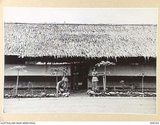 LAE AREA, NEW GUINEA, 1945-08-10. THE ENTRANCE TO THE EDUCATION CENTRE, 2/7 GENERAL HOSPITAL, UNDER THE COMMAND OF THE DEPUTY ASSISTANT DIRECTOR OF EDUCATION, LAE BASE SUB-AREA