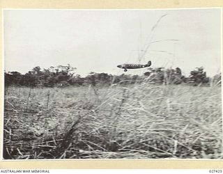 WANIGELA, NEW GUINEA, 1942-10. AMERICAN TRANSPORT PLANE TAKING OFF FROM THE RUNWAY AT WANIGELA. THIS RUNWAY WAS PREPARED BY THE 2/10TH AUSTRALIAN INFANTRY BATTALION TO ALLOW PLANES TO FLY IN FROM ..