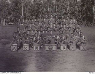 TOROKINA, SOUTH BOUGAINVILLE ISLAND, 1945-10-19. UNIDENTIFIED MEMBERS OF THE 15TH BRIGADE BAND. (PHOTOGRAPHER PTE P. SPIDEN)