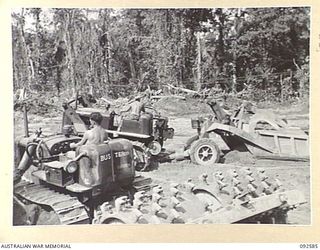 BOUGAINVILLE. 1945-05-26. ENGINEERS OF 58 CORPS FIELD PARK, ROYAL AUSTRALIAN ENGINEERS, USING MECHANICAL EQUIPMENT ON THE CONSTRUCTION OF A 3-TONNER ROAD ALONG THE OLD BUIN ROAD. THE TRACTOR IN ..