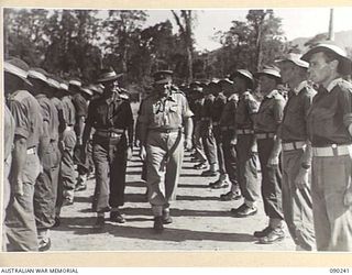 BOUGAINVILLE. 1945-04-03. COLONEL A.L. DAWKINS, DEPUTY DIRECTOR OF MEDICAL SERVICES 2 CORPS (2), AND LIEUTENANT COLONEL S.D. MEARES (1), INSPECTING 7 FIELD AMBULANCE PERSONNEL