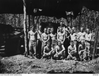 BOUGAINVILLE. 1945-08-30. MEMBERS OF 2/4 ARMOURED REGIMENT WORKSHOP. THESE MEN HAVE BEEN ENGAGED IN REPAIR WORK ON MATILDA TANKS AND UNIT VEHICLES IN FORWARD AREAS