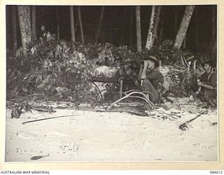 SIROT ISLAND, JOINING GREEN ISLAND, BOUGAINVILLE AREA, SOLOMON ISLANDS. 1944-12-20. PRIVATE W H VANSTONE, (1); PTE K G FOUNTAIN, (2); SERGEANT W J RANDALL, (3); AND PTE R R ROGERS, (4); ALONGSIDE A ..