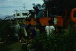 Unloading produce from village truck at Rabaul market