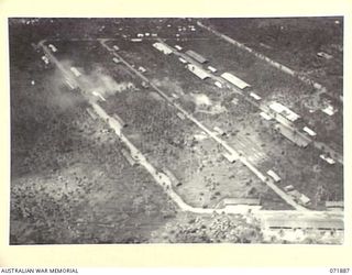 LAE, NEW GUINEA. 1944-03-30. THE BASE SUPPLY DEPOT VIEWED FROM THE AIR