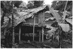 Houses in what appears to be a coastal Christian village, likely not in Kwaio