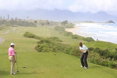 Barack Obama plays golf with Prime Minister Najib Razak, Joe Paulsen, and Mike Brush in Kaneohe Bay, Hawaii, December 24, 2014