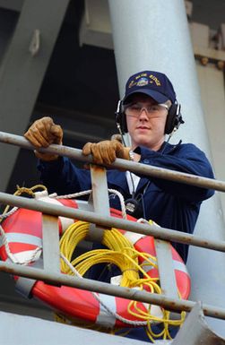 US Navy (USN) Hull Technician Second Class (HT2) Joseph Marcotte monitors the USN Amphibious Command Ship USS BLUE RIDGE (LCC 19) proximity to the pier on its arrival at US Naval Forces Marianas, Guam. The BLUE RIDGE is here to participate in Exercise TANDEM THRUST 2003