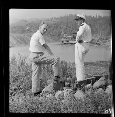 Qantas New Guinea, executives, Mr L W Burgstrand (left), Acting Manager, and Captain W Forgan-Smith, Bulolo, Morobe, Papua New Guinea