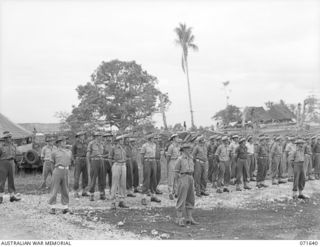 HELDSBACH MISSION, FINSCHHAFEN, NEW GUINEA. 1944-03-27. MEMBERS OF THE 2/3RD CASUALTY CLEARING STATION ON PARADE. (JOINS WITH PHOTOGRAPH NO 071641). IDENTIFIED PERSONNEL ARE: NX65171 WARRANT ..