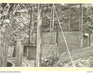 PORT MORESBY, NEW GUINEA. 1944-04-15. MAGAZINES AND GUN TURRET AT THE TWIN 6 POUNDER GUN PIT, GEMO SECTION, CONSTRUCTED BY THE 8TH ARMY TROOPS COMPANY, ROYAL AUSTRALIAN ENGINEERS, USING MATERIAL ..