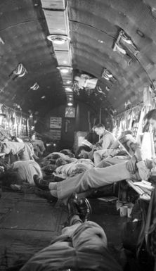 Interior of C-54 Plane, Kwajelein-Guam Flight; U.S. Reparations Mission