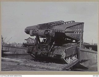 TOROKINA, BOUGAINVILLE. 1945-05-06. A 17 TON "CONVENANTER" BRIDGE TANK. THIS VEHICLE CARRIES A 20 FOOT SPAN BRIDGE WHICH CAN BE LAID BY THE DRIVER OF THE TANK WITHOUT LEAVING THE COCKPIT. THE ..