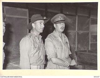 LAE AREA, NEW GUINEA, 1945-06-30. DURING HIS TOUR OF INSPECTION OF AUSTRALIAN TROOPS IN THE LAE AREA, HIS ROYAL HIGHNESS, THE DUKE OF GLOUCESTER, GOVERNOR-GENERAL OF AUSTRALIA (2) VISITED 8 FIELD ..