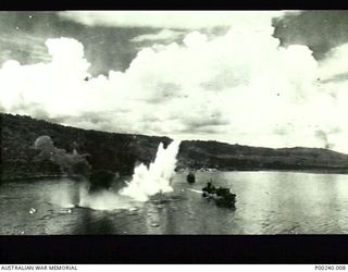 RABAUL, 1943-11-02. AIR STRIKE BY 75 B.25 MITCHELL BOMBERS AND 80 P38 LIGHTNING AIRCRAFT OF THE FIFTH AIR FORCE ON JAPANESE SHIPPING IN SIMPSON HARBOUR. (DONOR: W. TUCK)