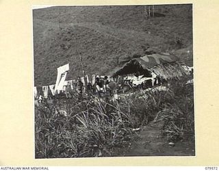 ORO BAY, NEW GUINEA. 1943-07. NATIVES WORKING IN THE LAUNDRY OF THE 10TH FIELD AMBULANCE