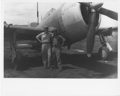 Charles Sims and Frank Huggins in front of plane "Jeanie"