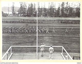 RABAUL, NEW BRITAIN. 1945-10-28. A CEREMONIAL PARADE AND MARCH PAST BY TROOPS OF 11 DIVISION WAS INSPECTED BY GENERAL SIR THOMAS A. BLAMEY, COMMANDER-IN-CHIEF, ALLIED LAND FORCES, SOUTH WEST ..