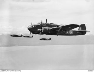 WEWAK AREA, NORTH NEW GUINEA. 1945-01-20. FOUR BEAUFORT BOMBER AIRCRAFT OF NO. 100 SQUADRON RAAF IN FLIGHT HEAD FOR WEWAK TO DESTROY JAPANESE FUEL AND AMMUNITION DUMPS. AIRCRAFT IN THE FOREGROUND ..