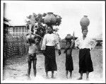 Samoan women and children carrying water, ca.1900