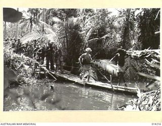 1943-01-25. PAPUA. NEARING THE END OF THE PAPUAN CAMPAIGN AGAINST JAPAN. AN IMPROVISED BRIDGE MADE BY ALLIED TROOPS TO ENABLE CONTACT TO BE MAINTAINED WITH THE RETREATING ENEMY AT SANANANDA. THE ..