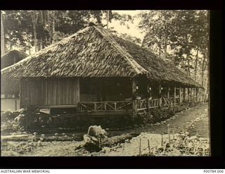 New Guinea. c. 1944. Exterior of a thatched hospital ward at an Australian General Hospital staffed by members of the Australian Army Nursing Service (AANS). (This image appears on page 10 of the ..