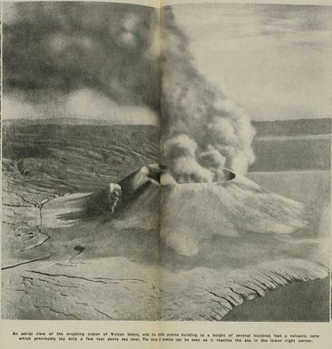 An aerial view of the erupting crater of Vulcan Island, Papua New Guinea