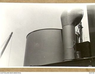 SYDNEY, NSW. 1944-01-22. A GUN NEST FOR A 20MM CANNON BEING FITTED IN THE STERN OF THE MV "FRANCES PEAT" BEFORE THE SHIP IS PUT INTO SERVICE WITH THE AUSTRALIAN SMALL SHIPS SECTION IN NEW GUINEA ..