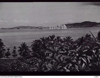 PORT MORESBY, PAPUA. 1942-03-19. VIEW FROM RAAF HEADQUARTERS OF THE BOMBING OF WANAKA BY JAPANESE AIRCRAFT