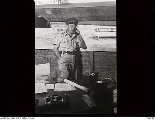 Lae, New Guinea. 1944-06-29. Portrait of Brigadier A. G. Torr, Chief Electrical and Mechanical Engineer, HQ New Guinea Force, in his office